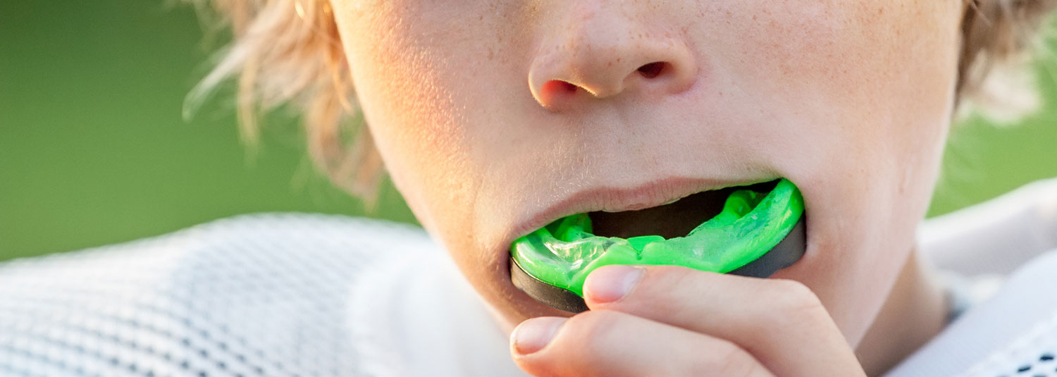 kid wearing mouthguard